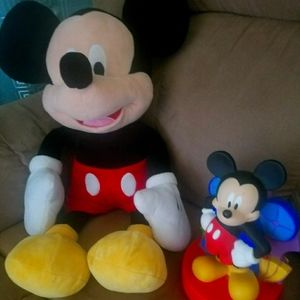 Mickey mouse stuffed toy with piggy bank